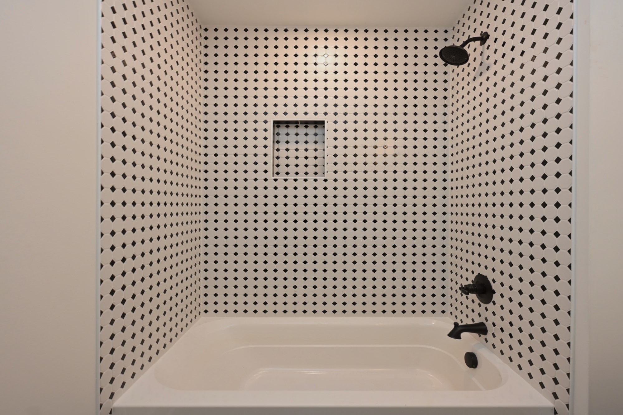 1212 Stockell Street Nashville, TN 37207 - Photo 69 of 86 a bathroom with a bathtub and a shower