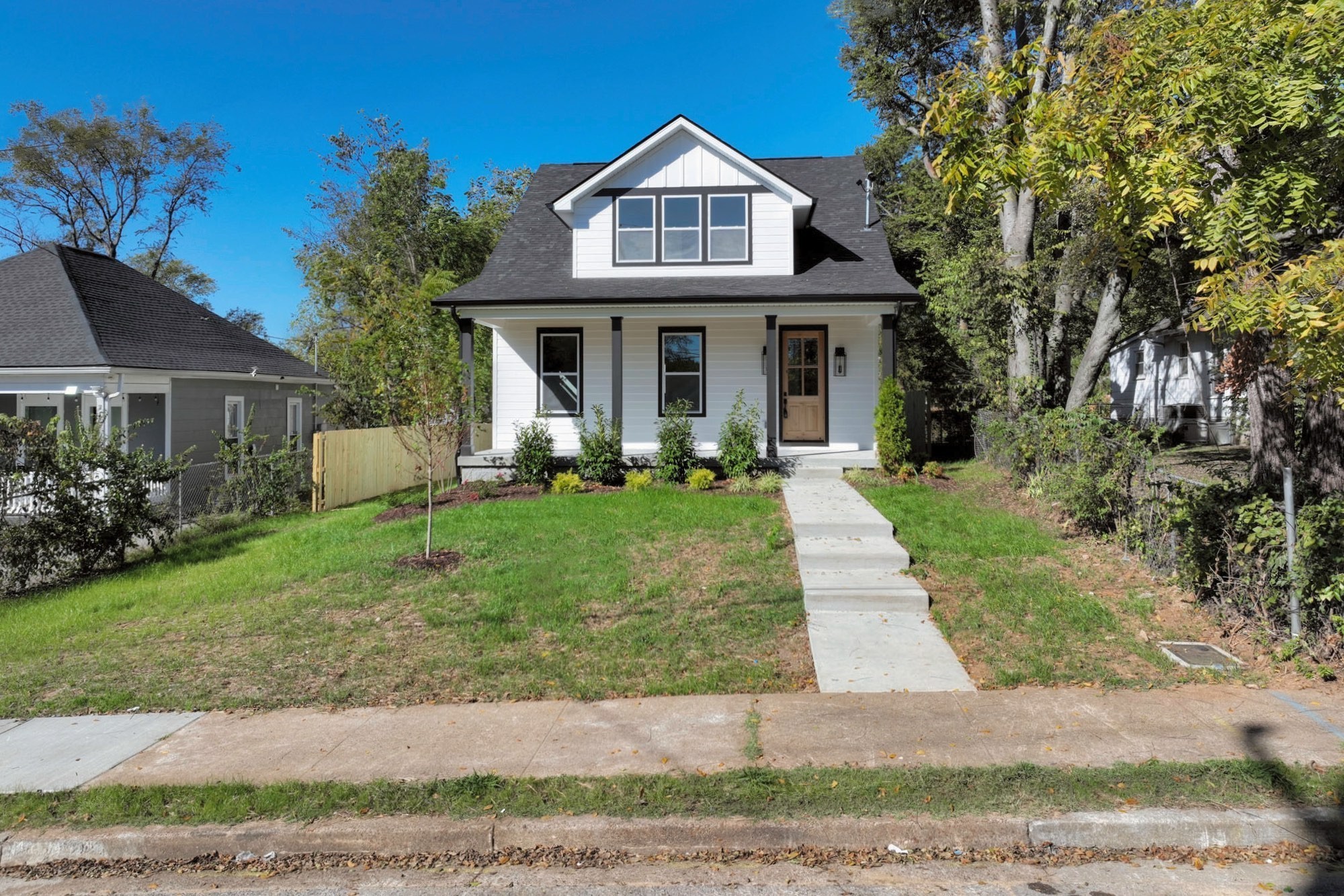 1212 Stockell Street Nashville, TN 37207 - Photo 71 of 86 a front view of a house with garden