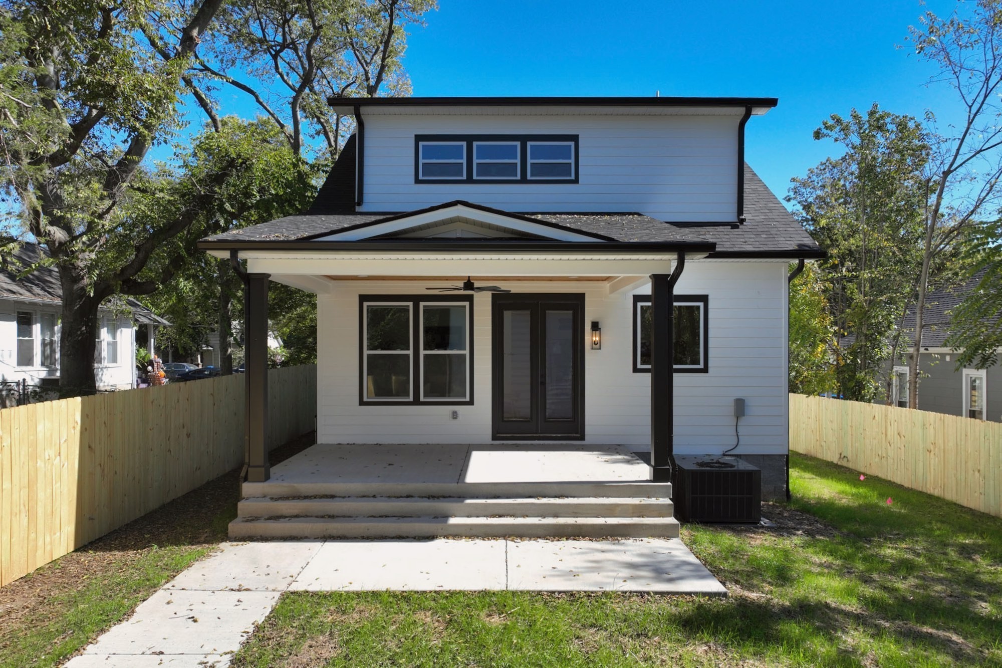 1212 Stockell Street Nashville, TN 37207 - Photo 85 of 86 a front view of a house with a garden