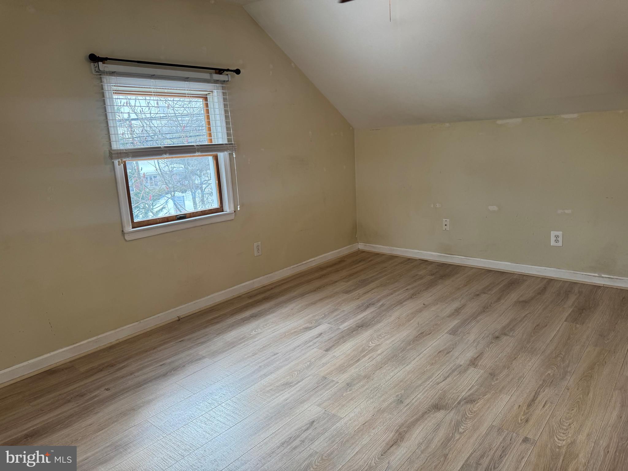 3849 Church Road Mount Laurel, NJ 08054 - Photo 13 of 19 a view of an empty room with wooden floor and a window