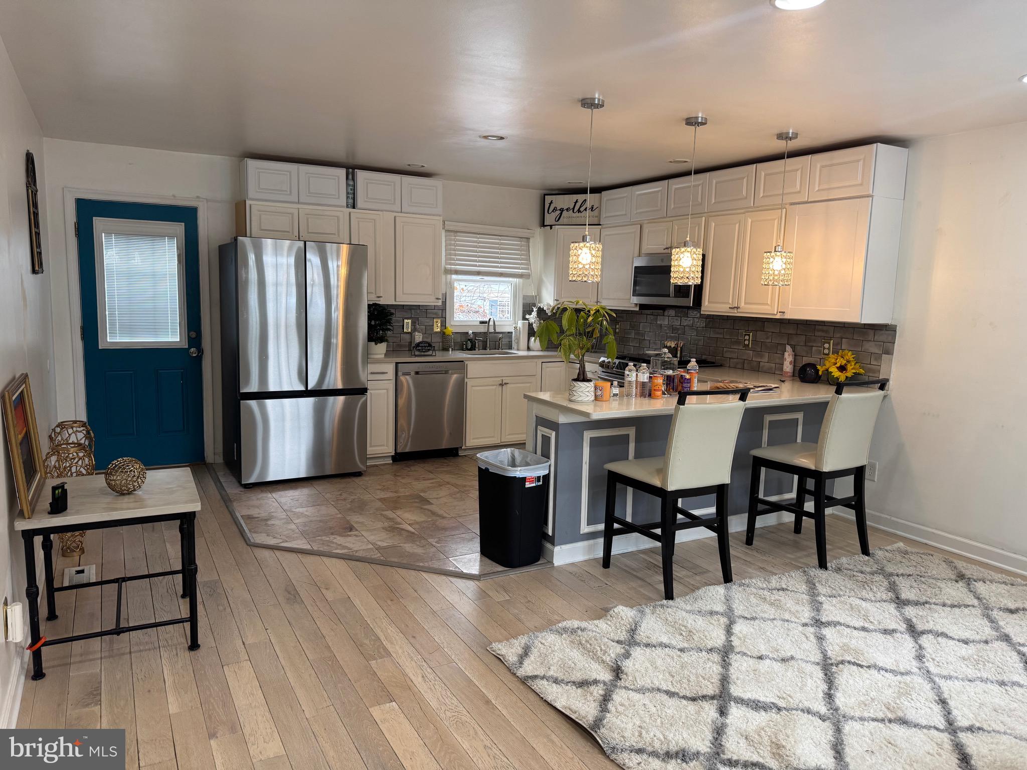 3849 Church Road Mount Laurel, NJ 08054 - Photo 2 of 19 a kitchen with a sink cabinets and appliances