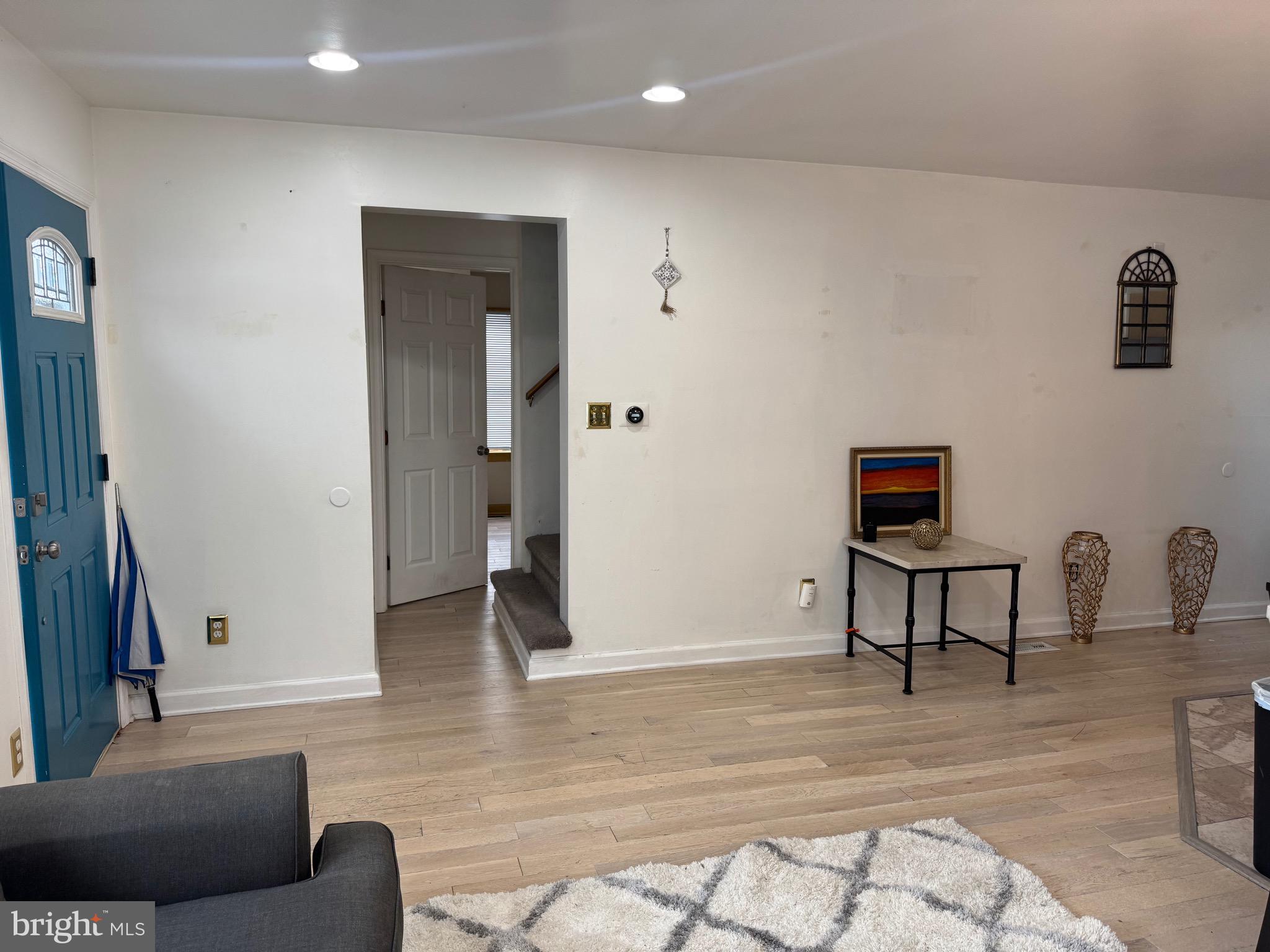 3849 Church Road Mount Laurel, NJ 08054 - Photo 4 of 19 a living room with furniture and a table