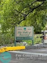 a view of a yard with an outdoor seating