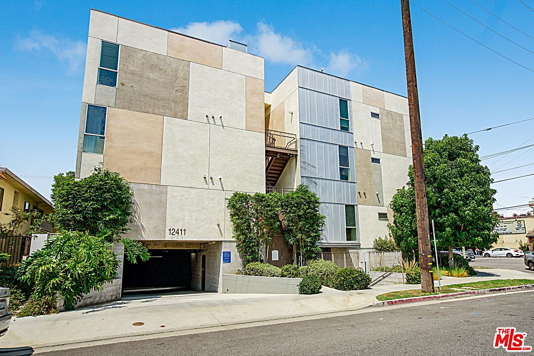12411 Pacific Avenue, Unit 205 Los Angeles, CA 90066 - Photo 2 of 21 front view of a building with a street