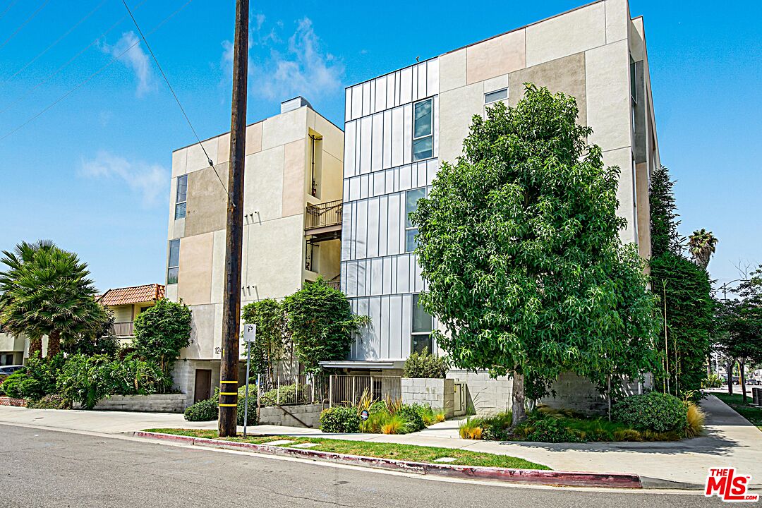12411 Pacific Avenue, Unit 205 Los Angeles, CA 90066 - Photo 21 of 21 a view of a tall building next to a road