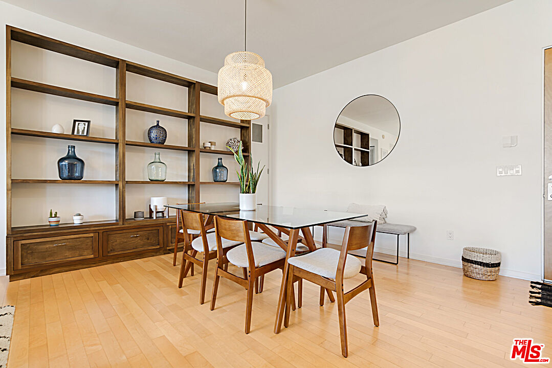 12411 Pacific Avenue, Unit 205 Los Angeles, CA 90066 - Photo 9 of 21 a view of a dining room with furniture