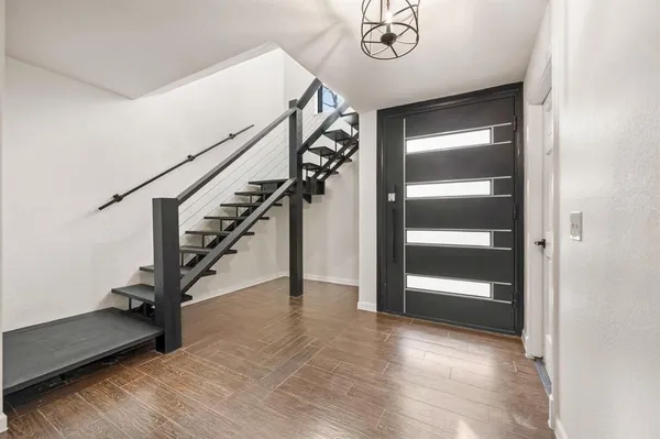 a view of an entryway with stairs