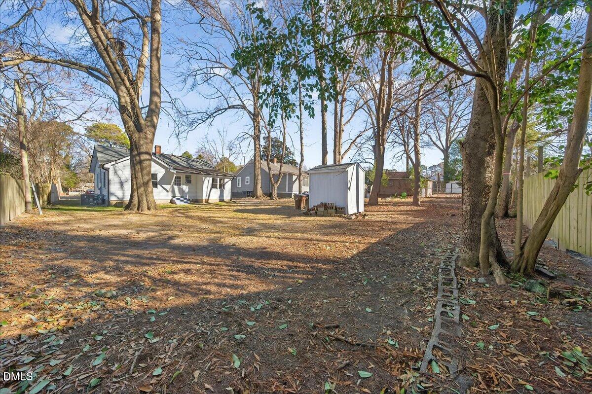 23 West Academy Street Wendell, NC 27591 - Photo 28 of 31 a view of road with trees