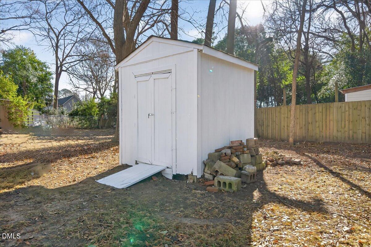 23 West Academy Street Wendell, NC 27591 - Photo 30 of 31 a backyard of a house