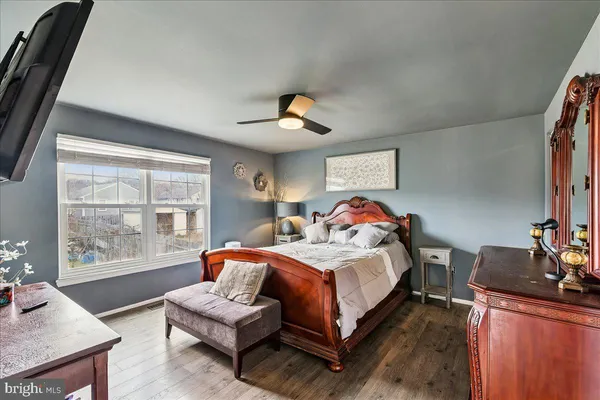 a bed room with a bed and a couch