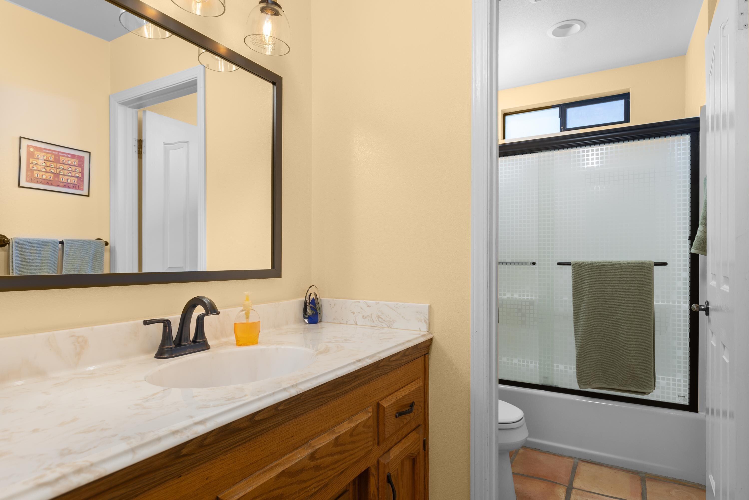 3194 Manley Drive Lompoc, CA 93436 - Photo 18 of 43 a bathroom with a sink and a mirror