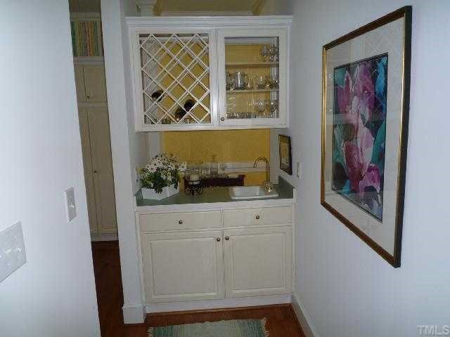 2908 Hawtree Drive Raleigh, NC 27613 - Photo 6 of 12 a view of a small dresser