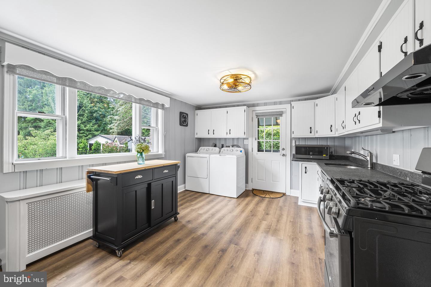 322 Conshohocken State Road Gladwyne, PA 19035 - Photo 16 of 31 a kitchen with stainless steel appliances granite countertop a stove a sink and a refrigerator