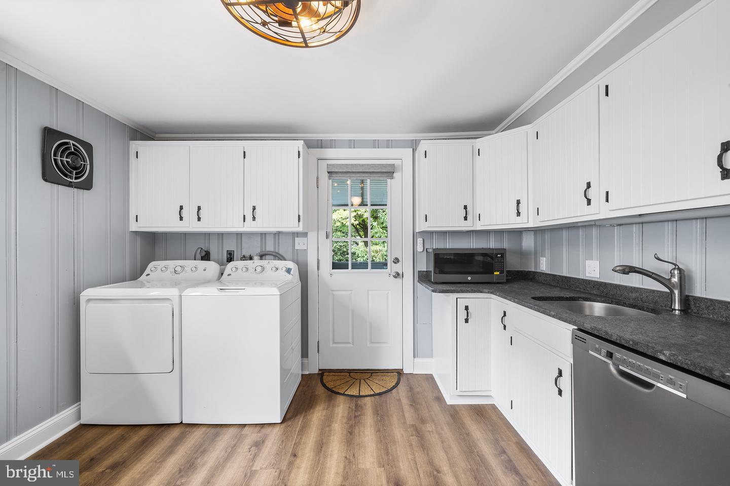 322 Conshohocken State Road Gladwyne, PA 19035 - Photo 17 of 31 a kitchen with a sink stove and cabinets