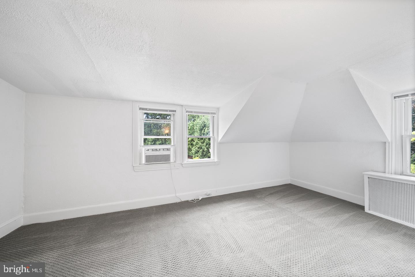 322 Conshohocken State Road Gladwyne, PA 19035 - Photo 22 of 31 an empty room with a window
