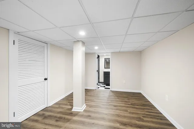 a view of an empty room with stairs