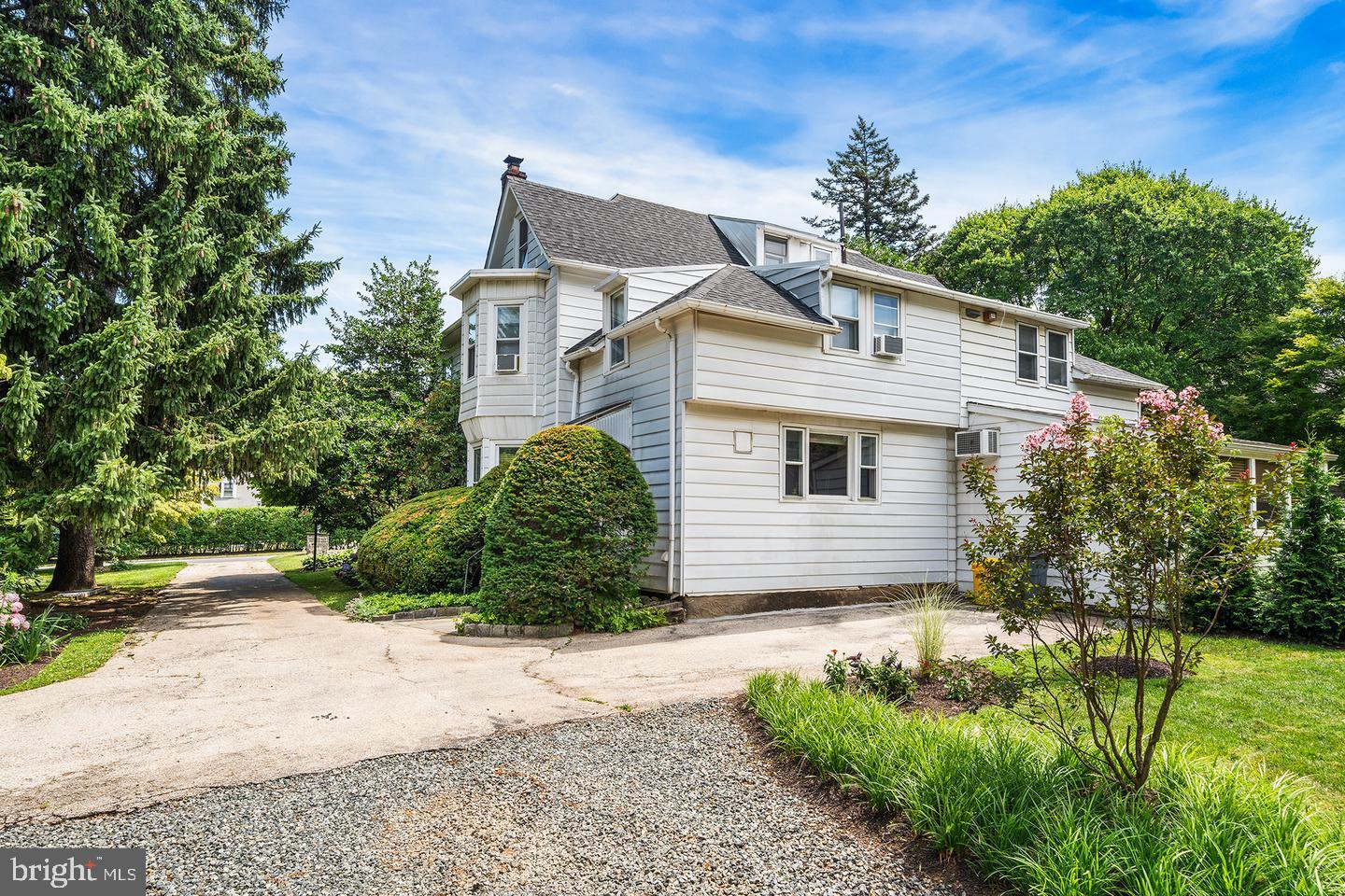 322 Conshohocken State Road Gladwyne, PA 19035 - Photo 6 of 31 a front view of house with yard and green space