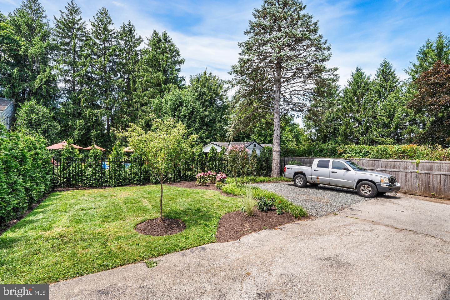 322 Conshohocken State Road Gladwyne, PA 19035 - Photo 7 of 31 a view of a backyard with a garden