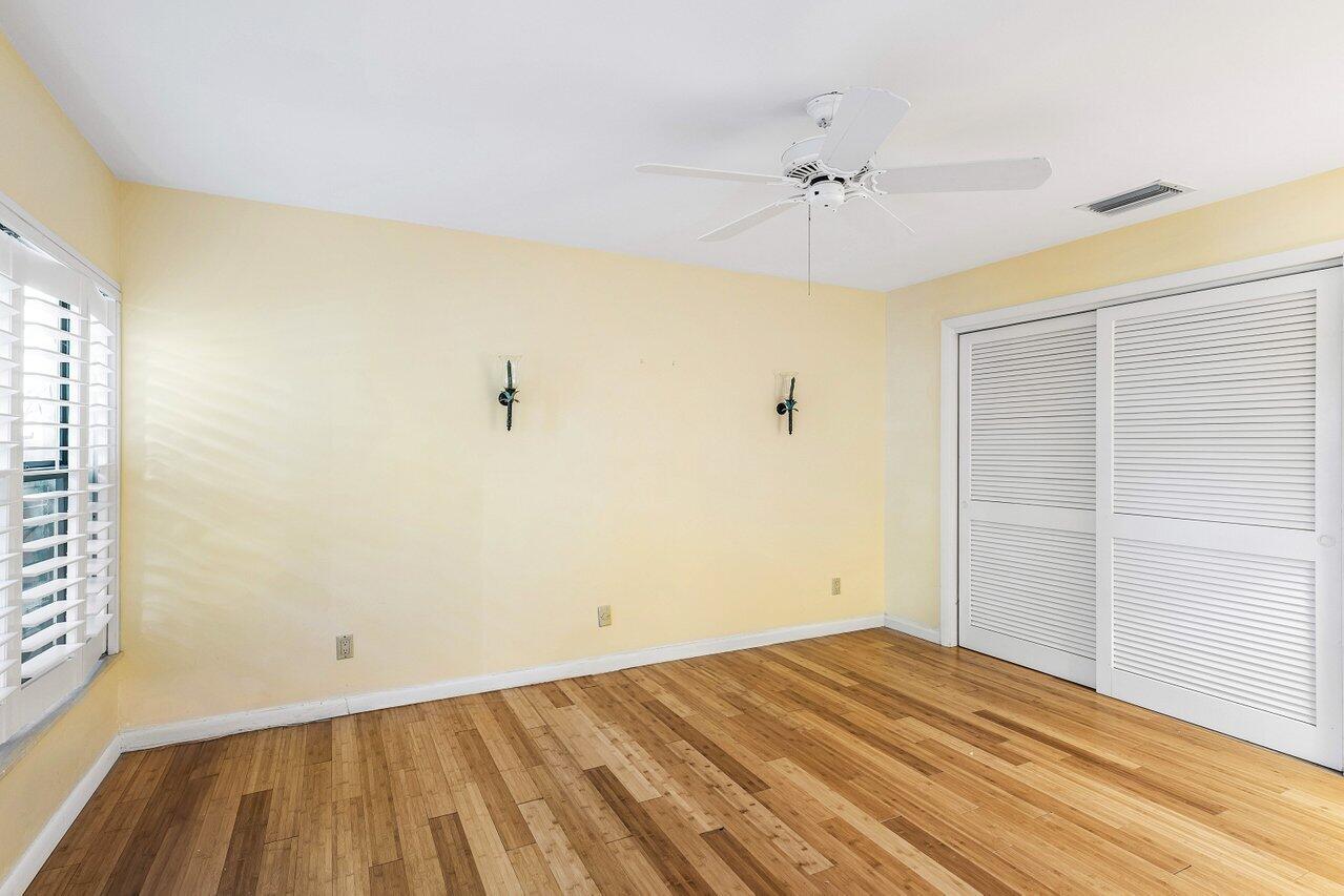 5109 North Ocean Boulevard, Unit E Ocean Ridge, FL 33435 - Photo 7 of 46 Lower level bedroom