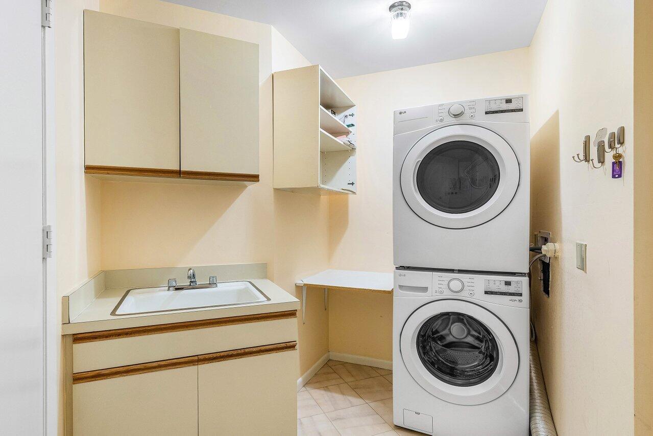 5109 North Ocean Boulevard, Unit E Ocean Ridge, FL 33435 - Photo 9 of 46 Laundry Storage Area