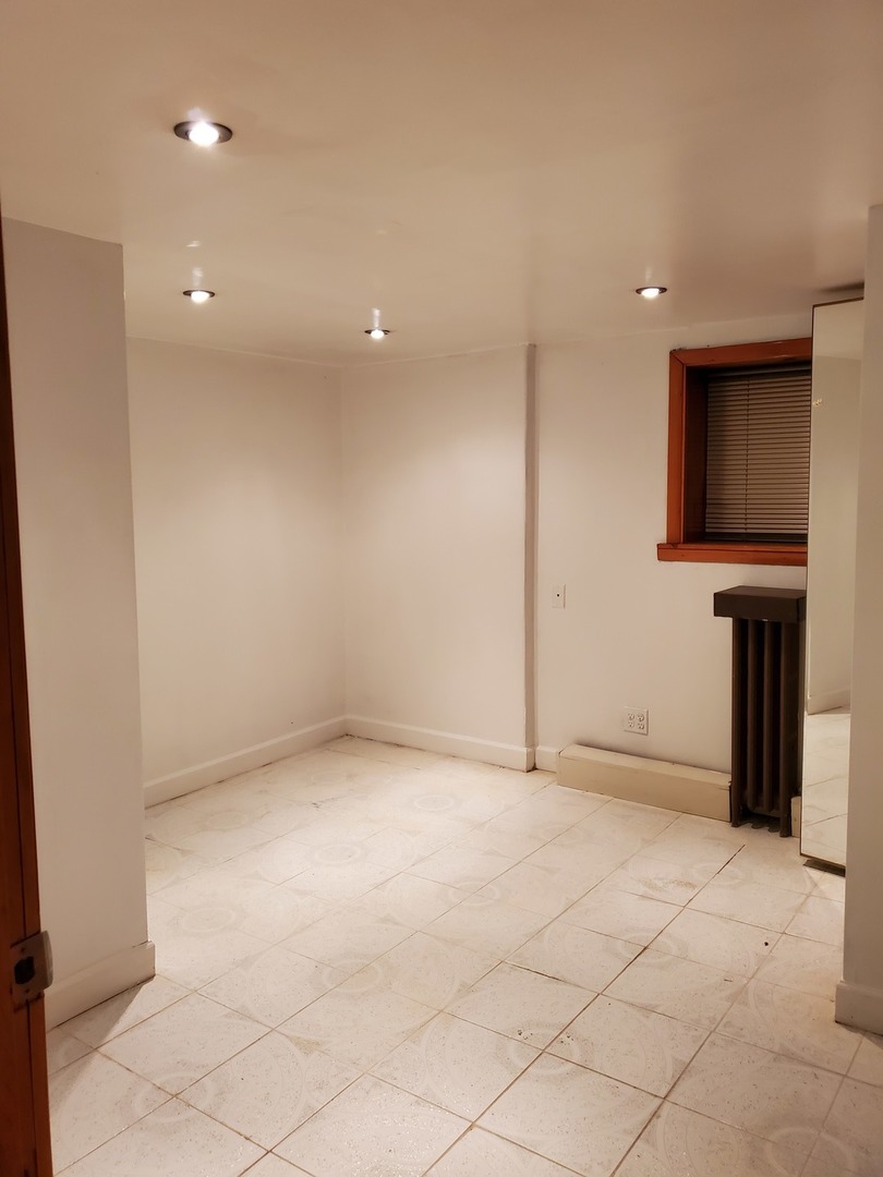 5135 West Roscoe Street, Unit B Chicago, IL 60641 - Photo 12 of 12 a view of an empty room