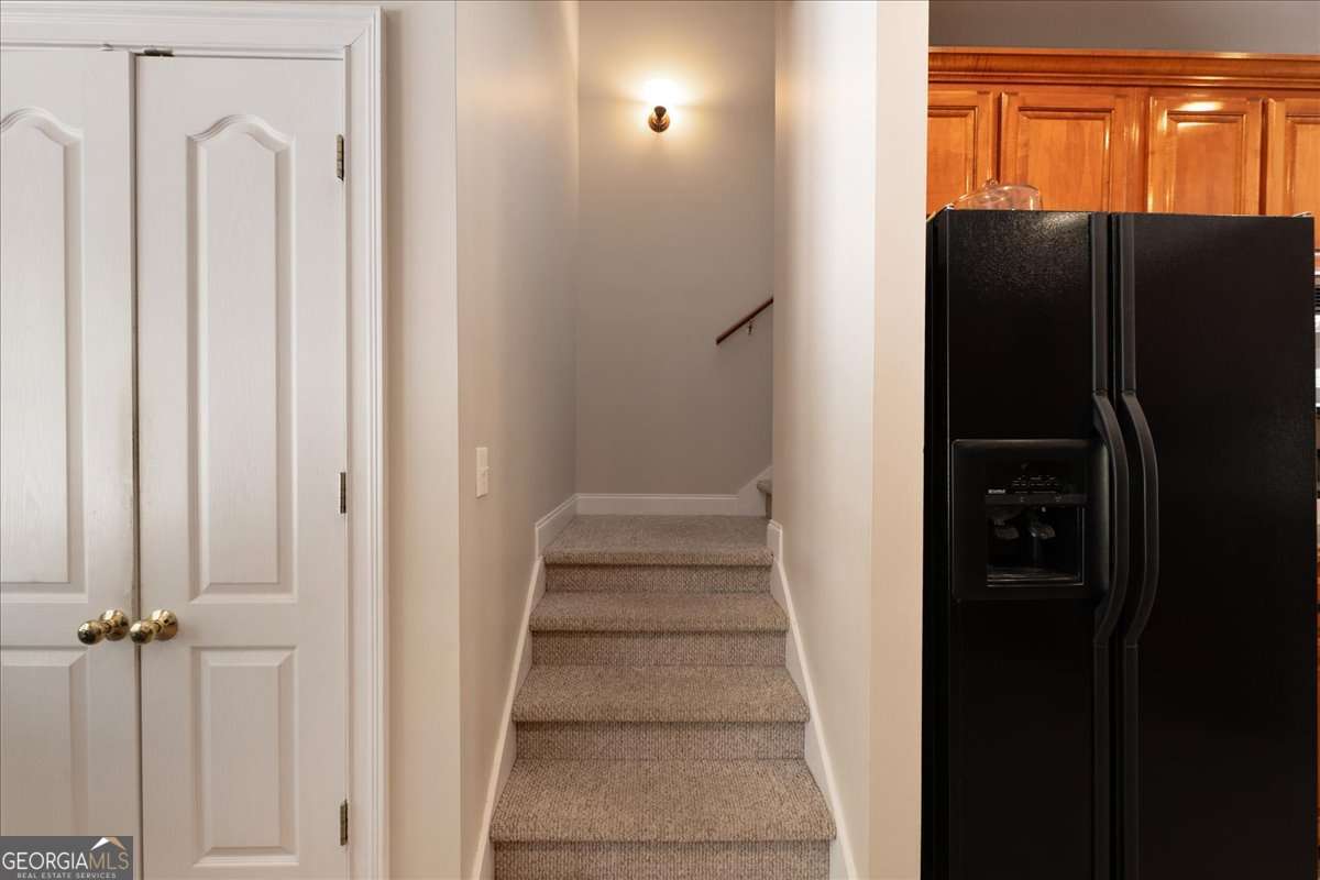 71 Staghorn Trail Nicholson, GA 30565 - Photo 13 of 32 a view of a closet with wooden floor