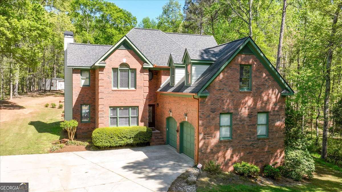 71 Staghorn Trail Nicholson, GA 30565 - Photo 2 of 32 a view of a house with a yard and plants