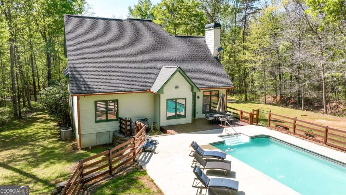 71 Staghorn Trail Nicholson, GA 30565 - Photo 21 of 32 a view of a house with backyard and sitting area