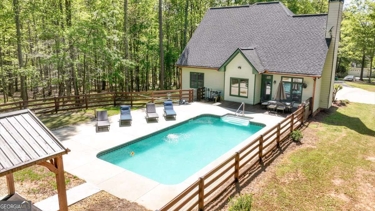 71 Staghorn Trail Nicholson, GA 30565 - Photo 23 of 32 a view of an house with swimming pool and sitting area