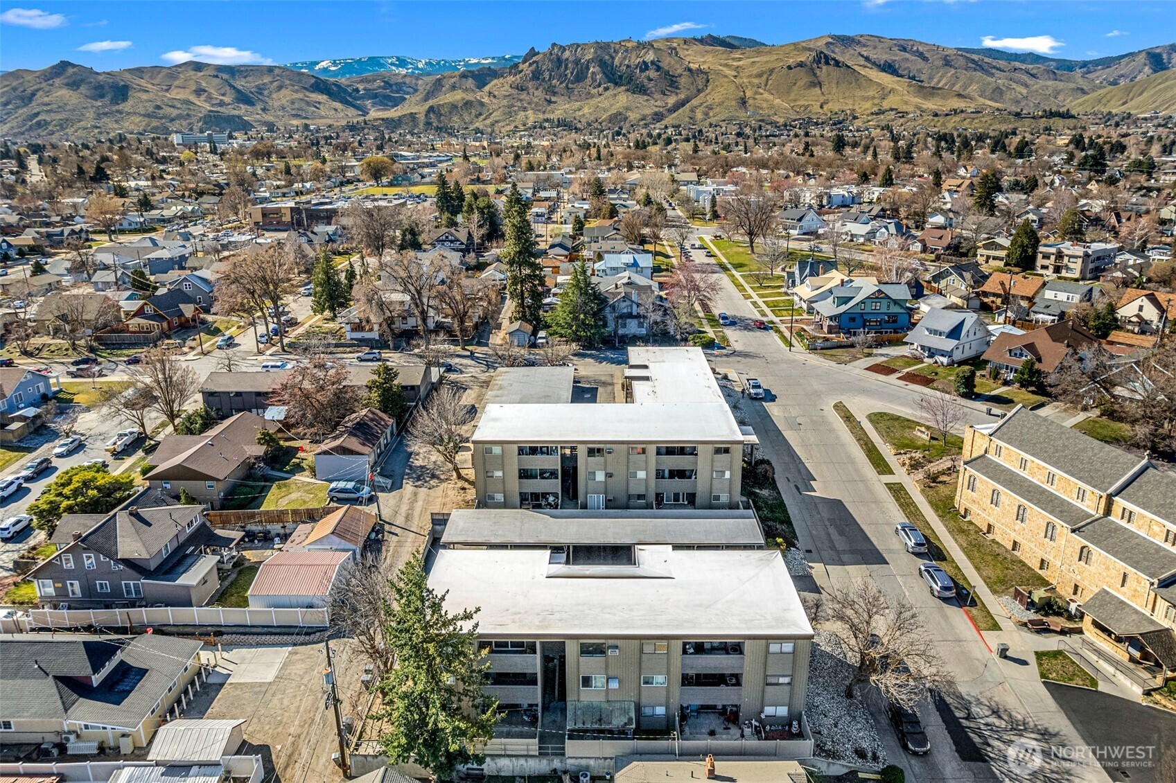 407 Oregon Street, Unit 231 Wenatchee, WA 98801 - Photo 24 of 31 an aerial view of residential houses with outdoor space
