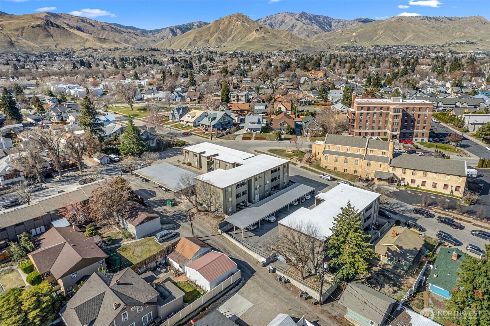 407 Oregon Street, Unit 231 Wenatchee, WA 98801 - Photo 26 of 31 an aerial view of a city with lots of residential buildings