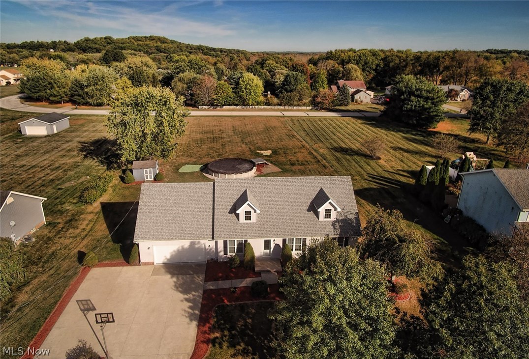 8073 South Cleveland Massillon Road Clinton, OH 44216 - Photo 2 of 35 View from above displays the new roof, ample outdoor parking space, perfectly flat 1 acre lot w/pool, and the beautiful natural setting looking East.