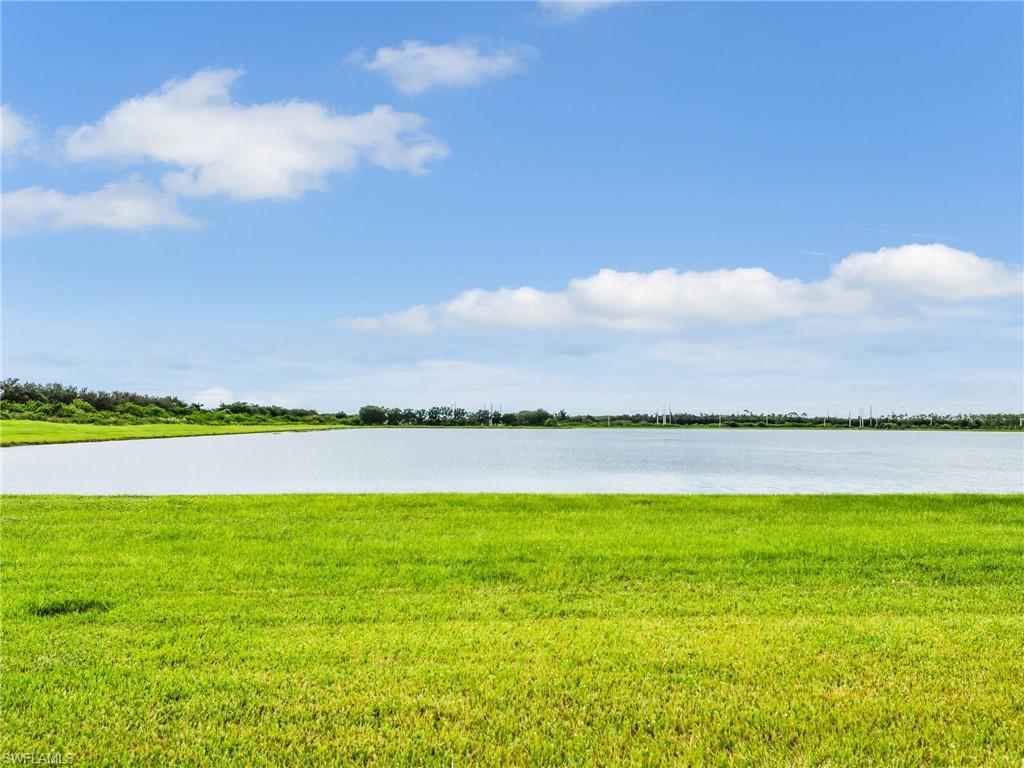 19724 Aqua View Lane Fort Myers, FL 33913 - Photo 33 of 44 a view of a lake and sunset