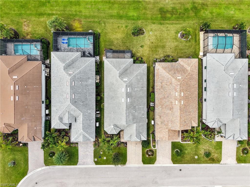 19724 Aqua View Lane Fort Myers, FL 33913 - Photo 39 of 44 aerial view of a house with a garden and plants