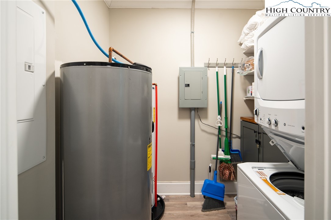 170 Inn At Crestwood Drive Boone, NC 28607 - Photo 30 of 33 a kitchen with stainless steel appliances granite countertop a refrigerator and a stove top oven