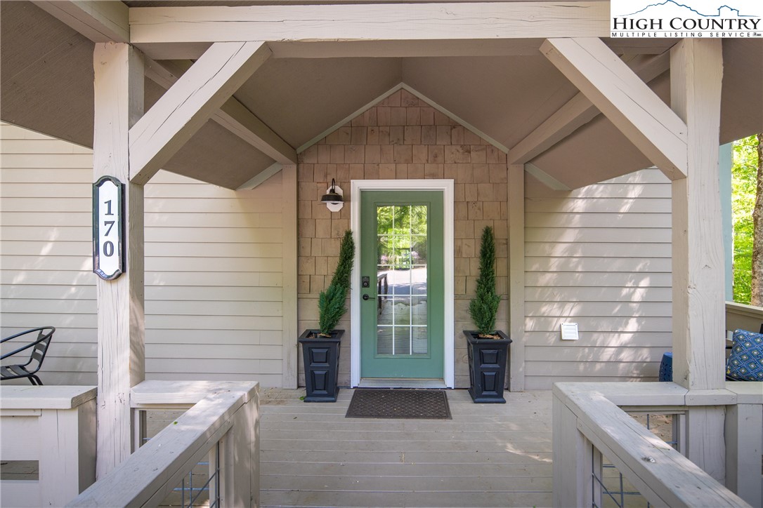170 Inn At Crestwood Drive Boone, NC 28607 - Photo 3 of 33 a view of a house with a sink and glass door