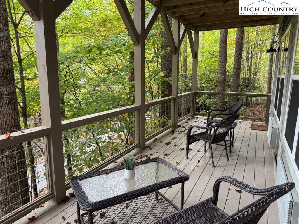 170 Inn At Crestwood Drive Boone, NC 28607 - Photo 31 of 33 a view of a city from a balcony with furniture