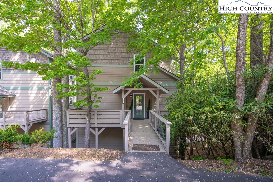 170 Inn At Crestwood Drive Boone, NC 28607 - Photo 32 of 33 a view of a house with a yard