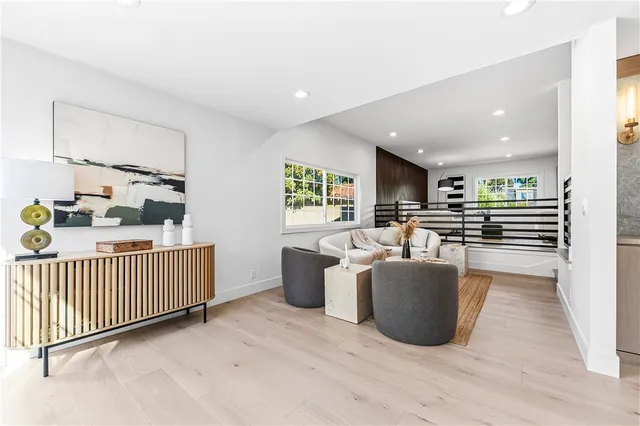 a kitchen with stainless steel appliances kitchen island granite countertop a sink and cabinets