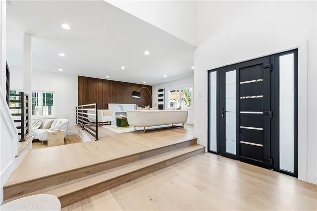 a living room with furniture and a table