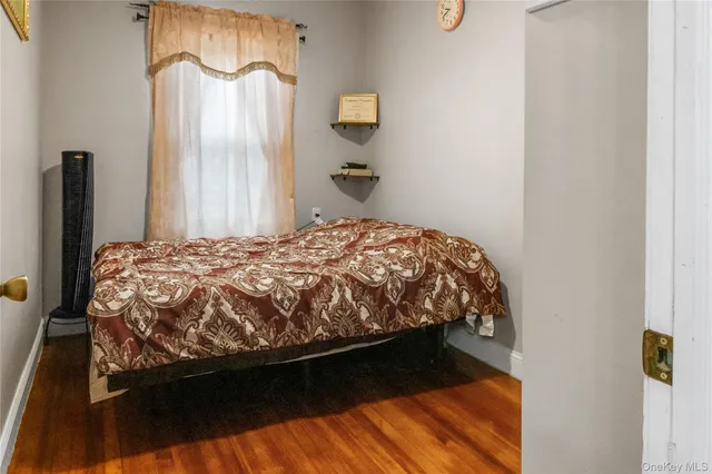 a view of a room with wooden floor and stairs