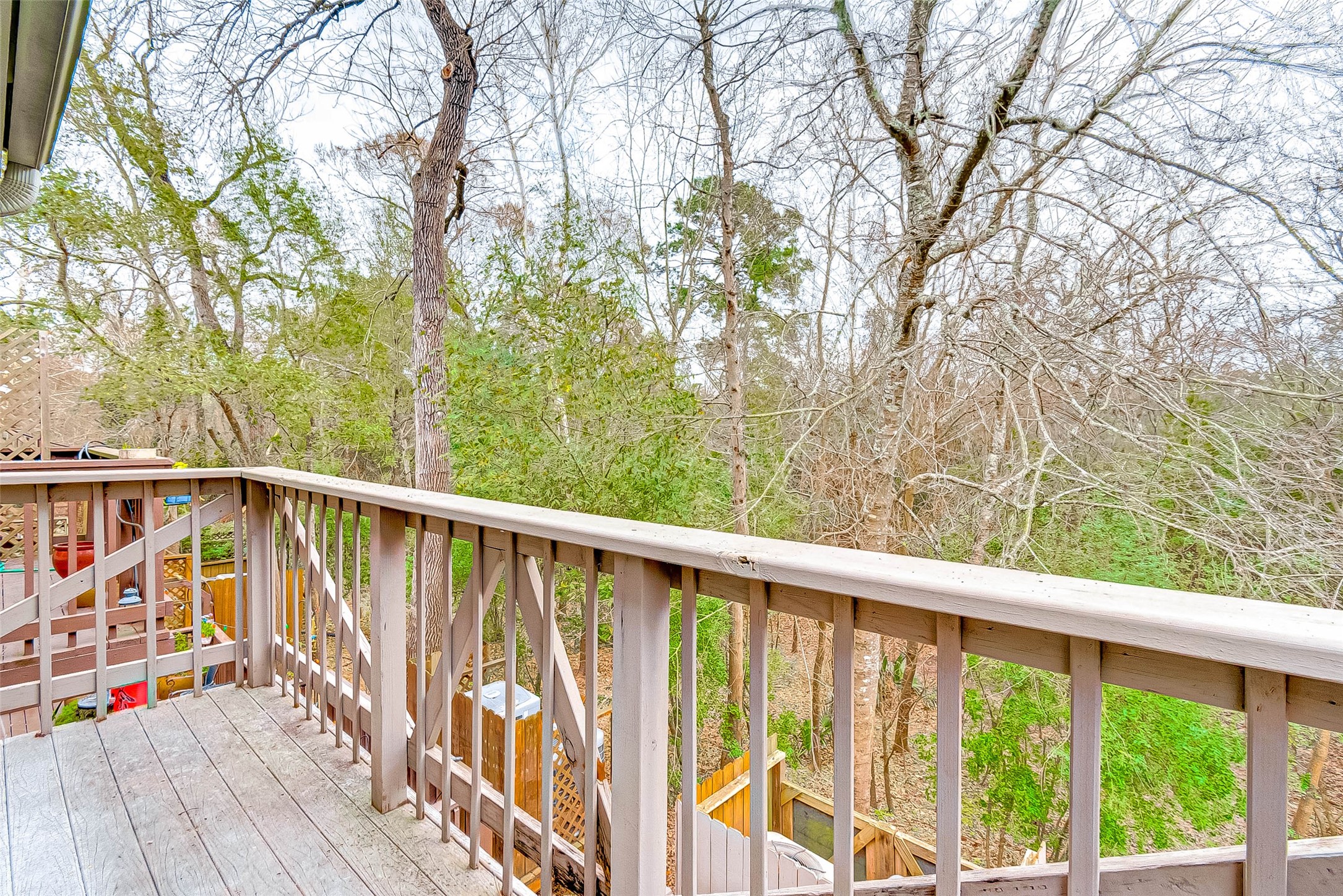 395 Rancho Bauer Drive Houston, TX 77079 - Photo 45 of 50 a view of balcony with wooden floor and fence