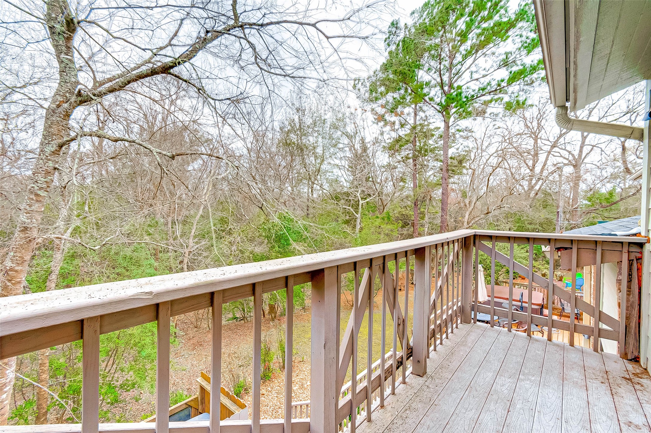 395 Rancho Bauer Drive Houston, TX 77079 - Photo 46 of 50 a view of balcony with wooden floor and fence