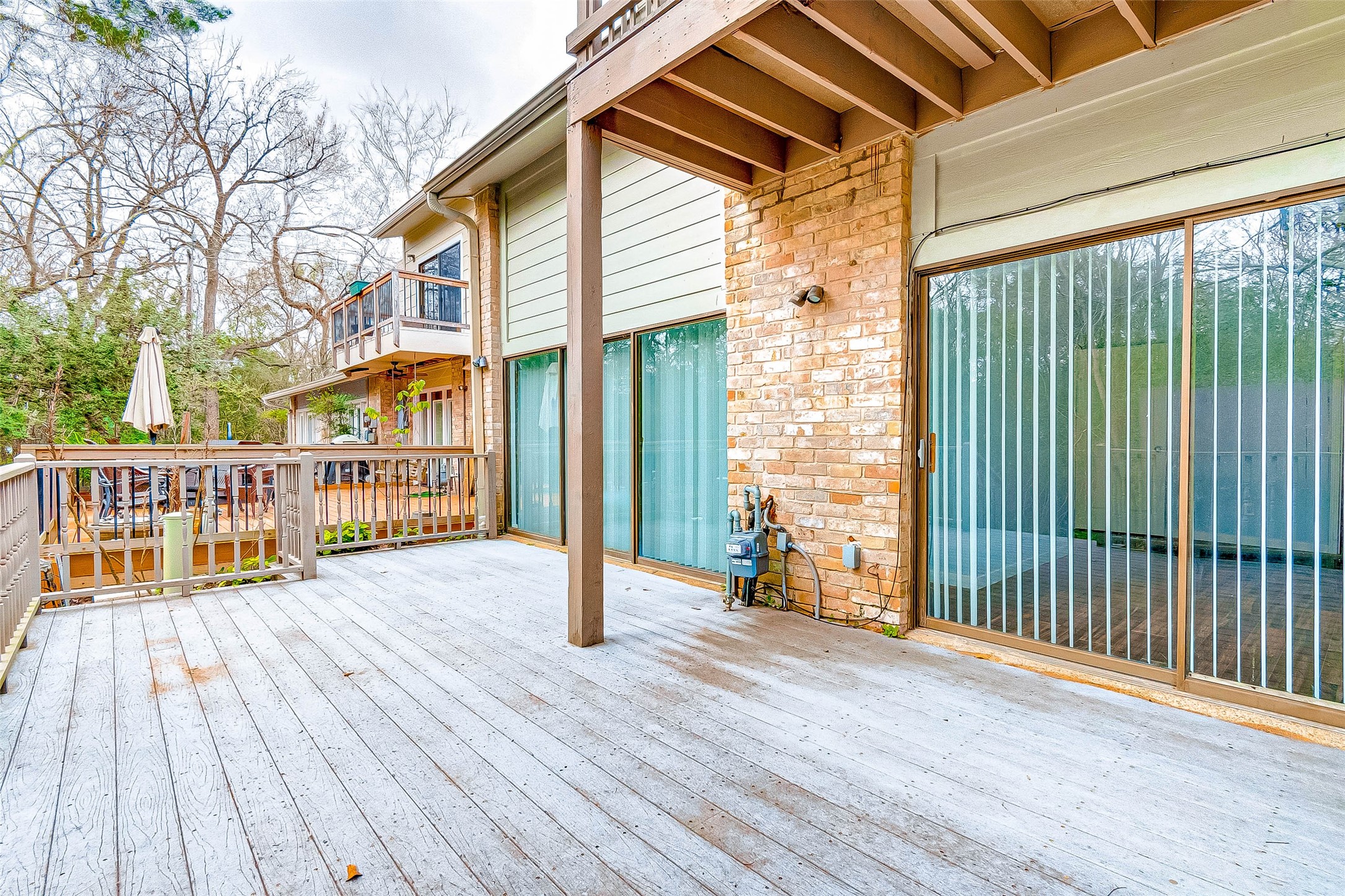 395 Rancho Bauer Drive Houston, TX 77079 - Photo 48 of 50 a view of a house with a deck