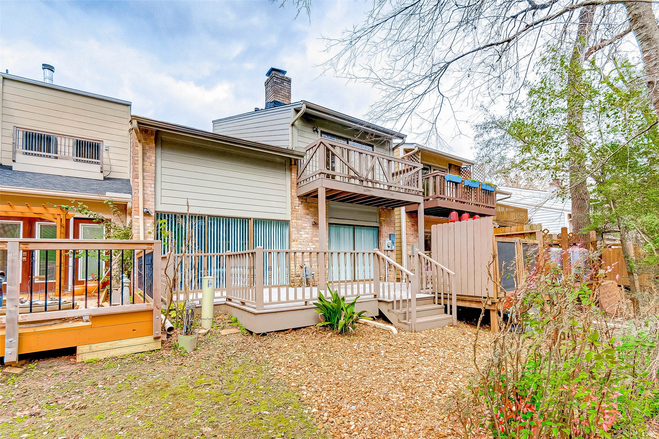 395 Rancho Bauer Drive Houston, TX 77079 - Photo 50 of 50 a view of a house with a wooden floor and a yard