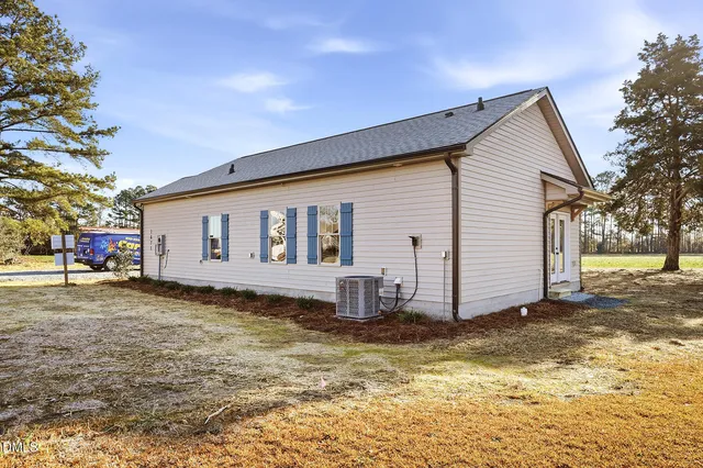 a house view with a garden space