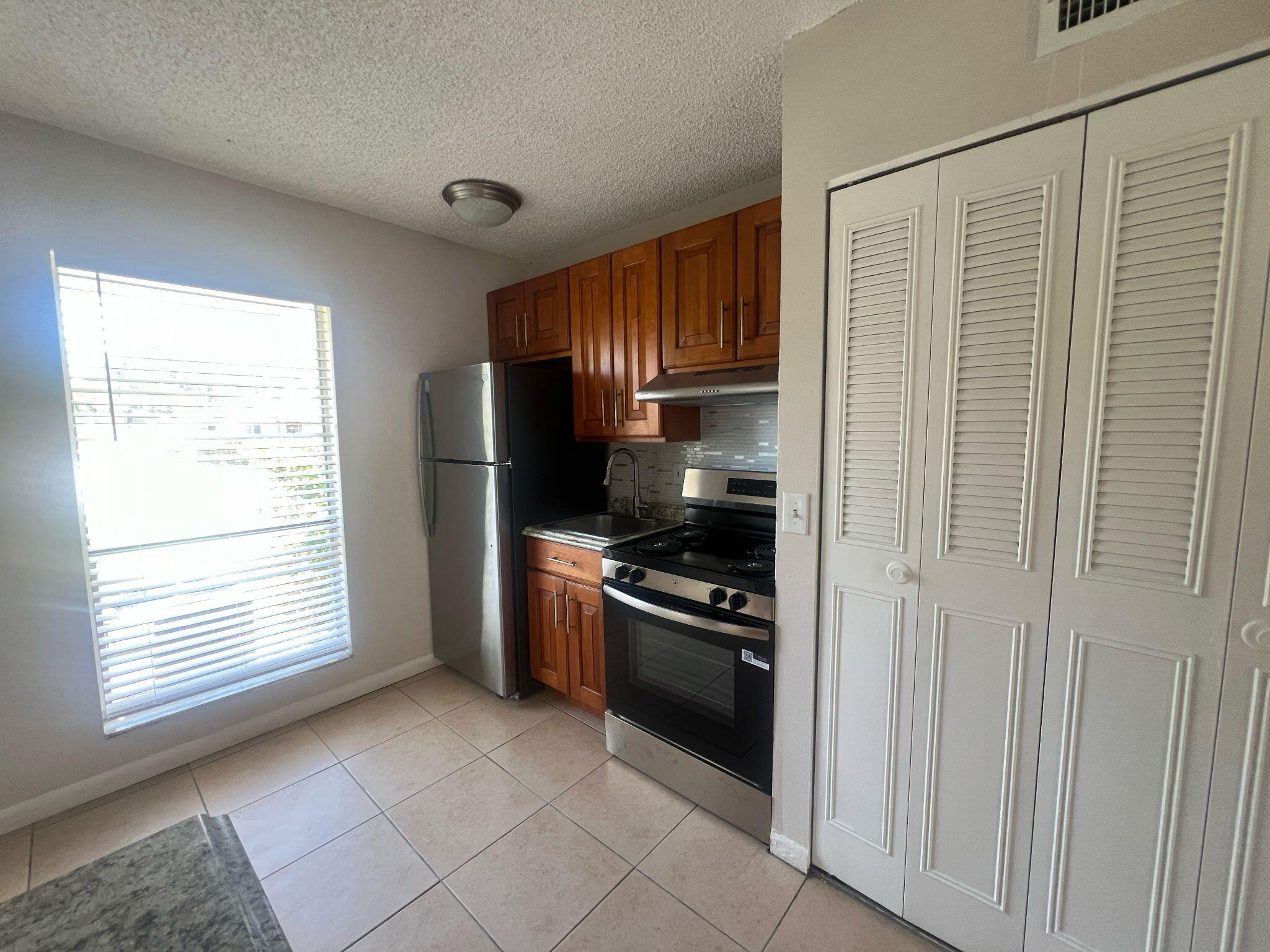 559 Northeast 48th Street, Unit 303 Boca Raton, FL 33431 - Photo 3 of 5 IMG_6464