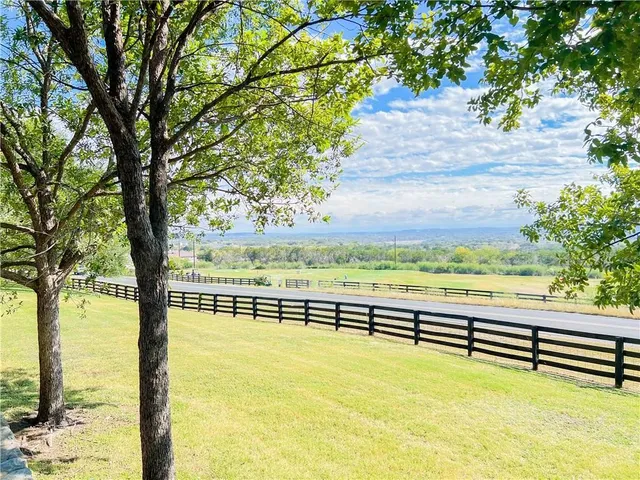 a view of an outdoor space and swimming pool