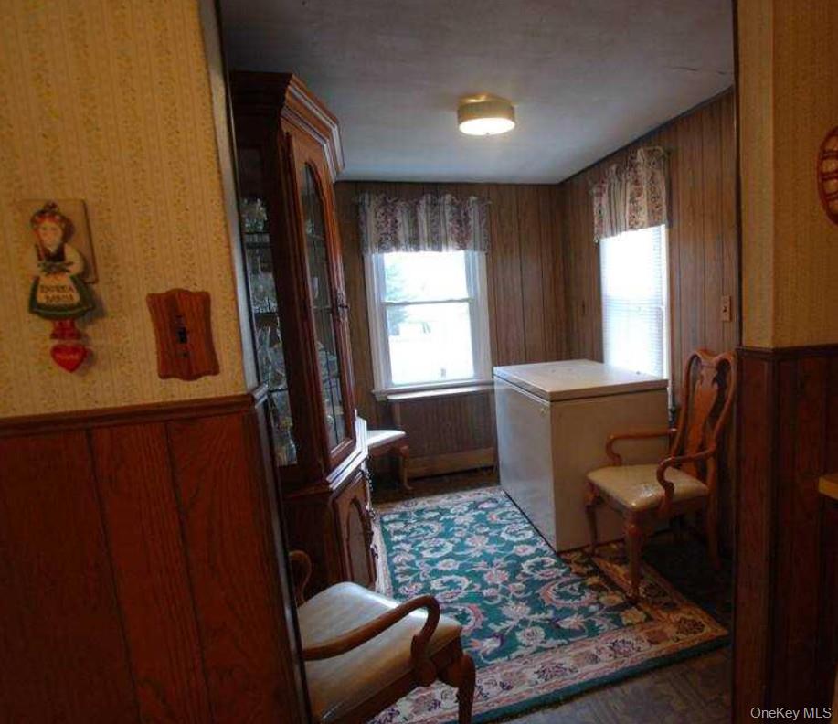 7 Miles Avenue Albertson, NY 11507 - Photo 3 of 8 a room with furniture and window