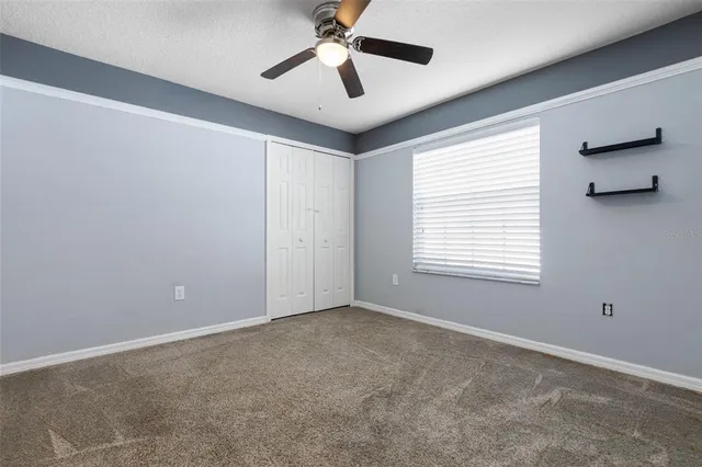 a view of a hallway with washer and dryer